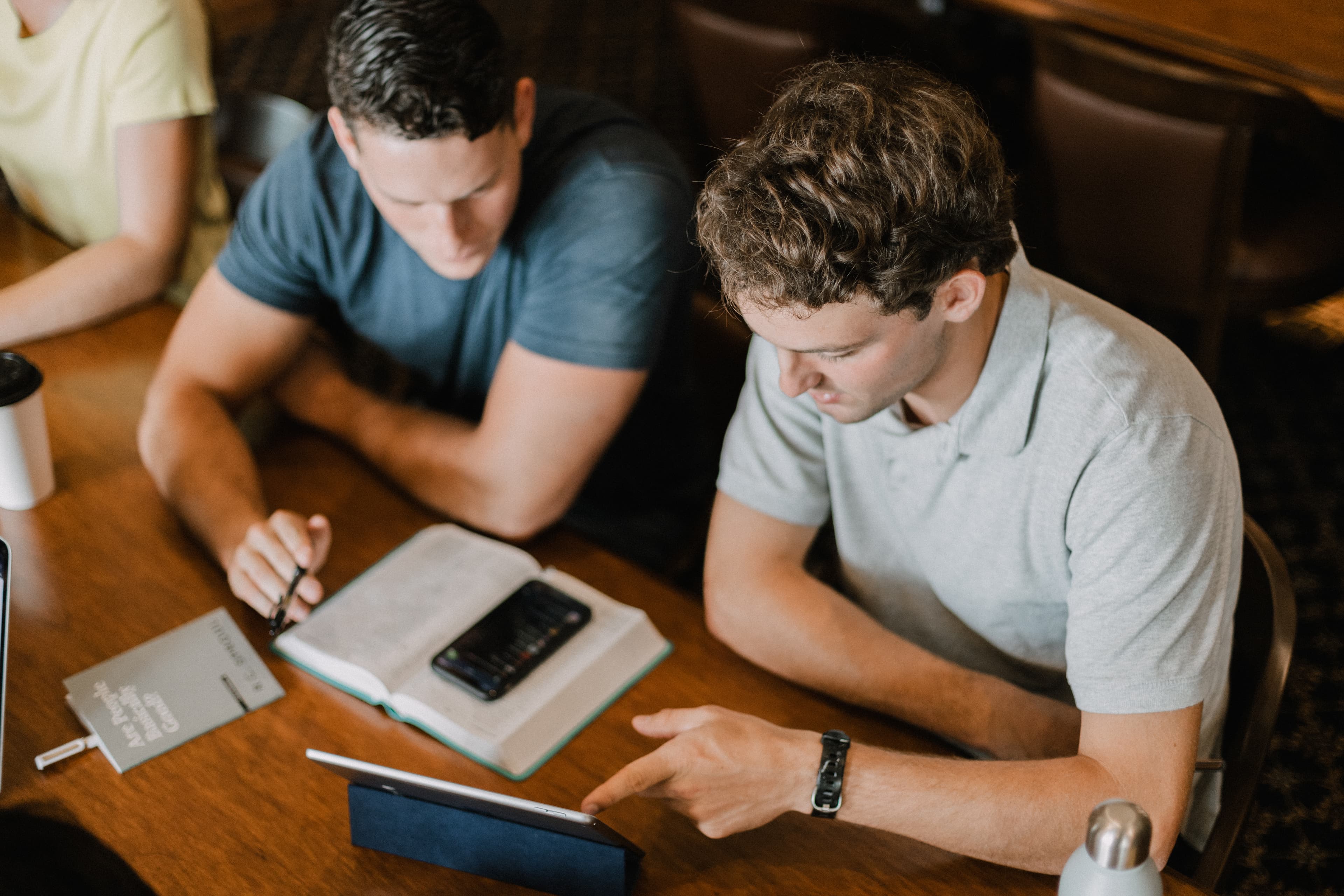 Two men studying together